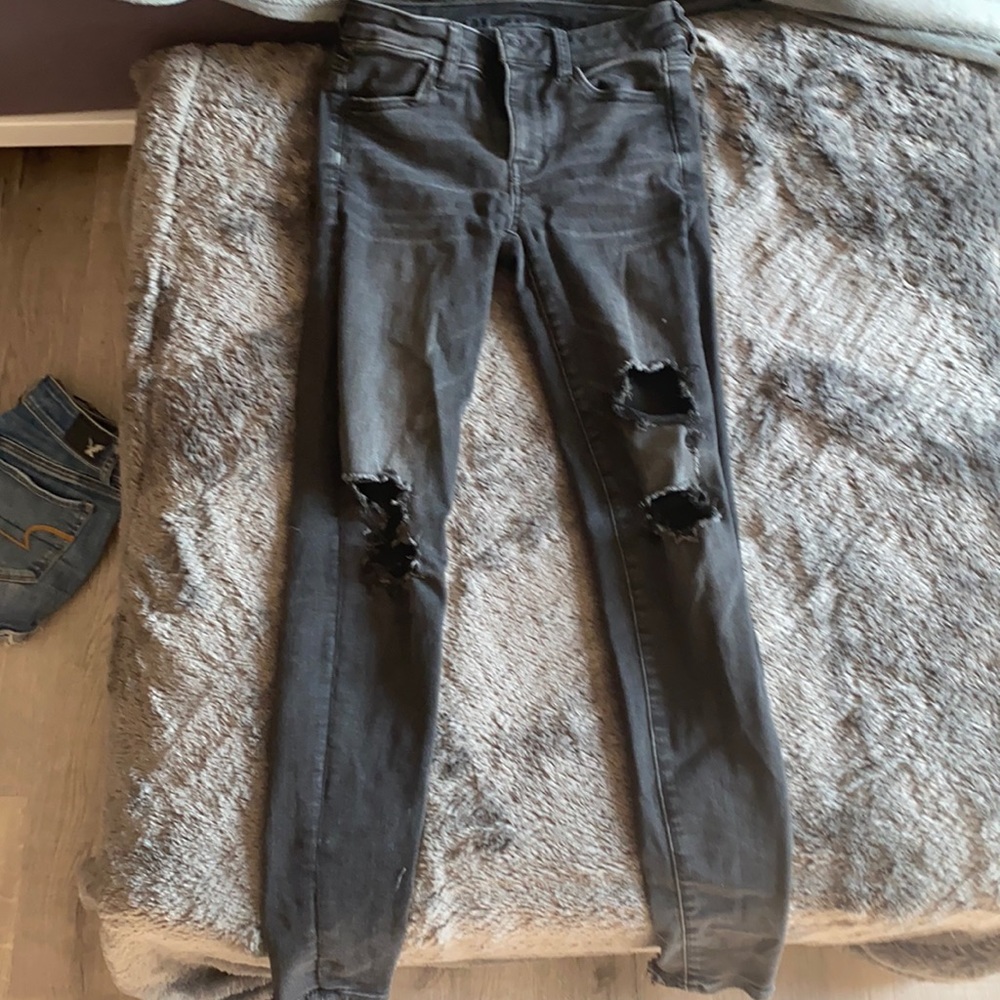 Black high waisted distressed jeans